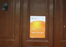 cone da foto do Poster de divulgao da Semana AL 2012 na porta da unidade Biblioteca Virtual, na Reitoria da U.Porto